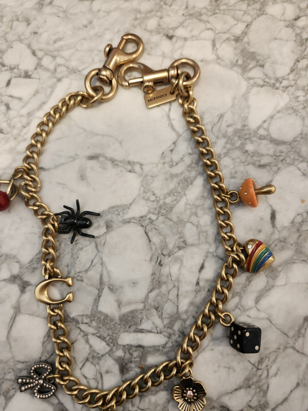 Coach Gold-Tone Charm Bracelet with Red Cherry and Black Spider Accents - Picture 3 of 5